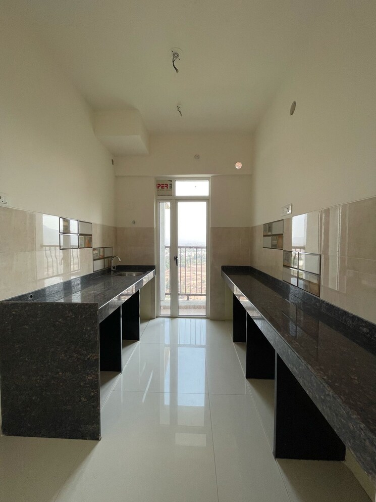 Kitchen, marathon-nexzone 3 Bedroom 922 Sq.Ft. Apartment In New Panvel Navi Mumbai 8754503