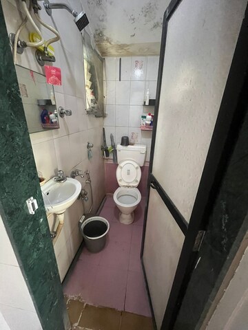 Bathroom in 2 BHK Apartment at Siddhanchal CHS, Pawar Nagar – for Rent