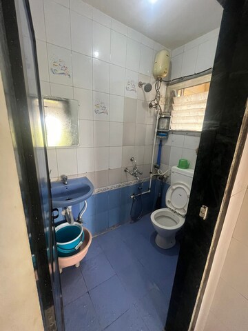 Bathroom in 2 BHK Apartment at Siddhanchal CHS, Pawar Nagar – for Rent