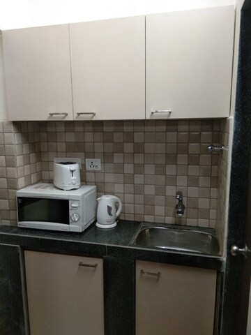 Kitchen in Studio Apartment at Arpora – for Sale