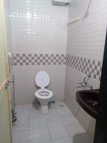 Bathroom in 3 BHK Apartment at Surana Vrind, Prabhat Road – for Rent