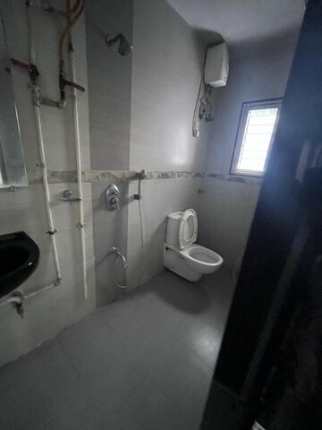 Bathroom in 2 BHK Apartment at Venus Upvan CHS, Gawand Baug – for Rent