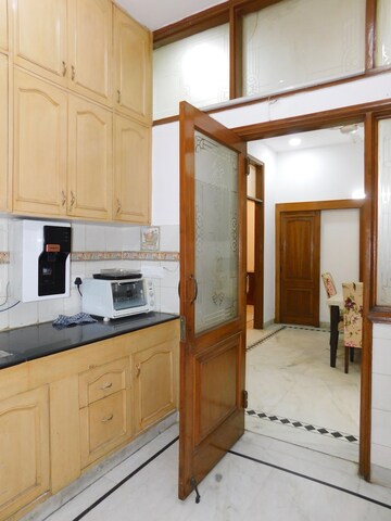 Kitchen in 3 BHK Builder Floor at Defence Colony – for Rent