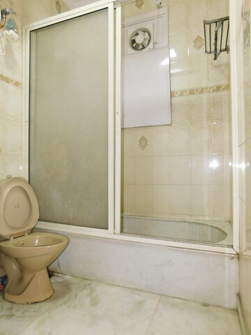 Bathroom in 3 BHK Builder Floor at Defence Colony – for Rent