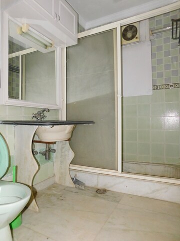 Bathroom in 3 BHK Builder Floor at Defence Colony – for Rent