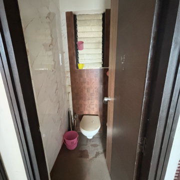 Building Lobby in 1 BHK Apartment at Tharwani Vedant Millenia, Titwala – for Rent