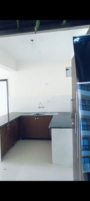 Kitchen in 1 BHK Apartment at Cosmos Express 99, Sector 99 – for Sale