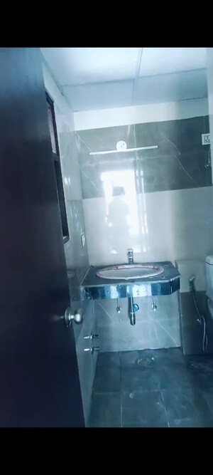 Bathroom in 1 BHK Apartment at Cosmos Express 99, Sector 99 – for Sale