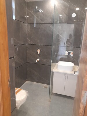 Bathroom in 3.5 BHK Builder Floor at Puri Aman Vilas, Sector 89 – for Sale