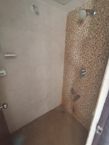 Bathroom in 1 BHK Apartment at Lodha Lakeshore Greens, Dombivli East – for Rent