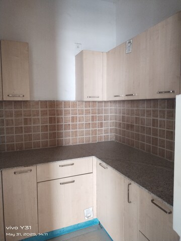 Kitchen in 2.5 BHK Apartment at Mahagun Mywoods, Sector 16c Greater Noida – for Rent