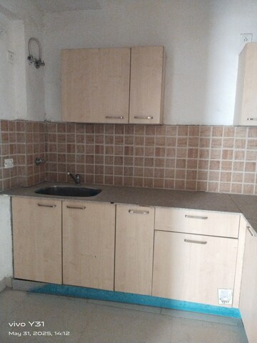Kitchen in 2.5 BHK Apartment at Mahagun Mywoods, Sector 16c Greater Noida – for Rent