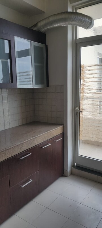 Kitchen in 3 BHK Apartment at Emaar Palm Gardens, Sector 83 – for Rent