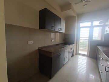 Kitchen in 3 BHK Apartment at Emaar Palm Gardens, Sector 83 – for Rent