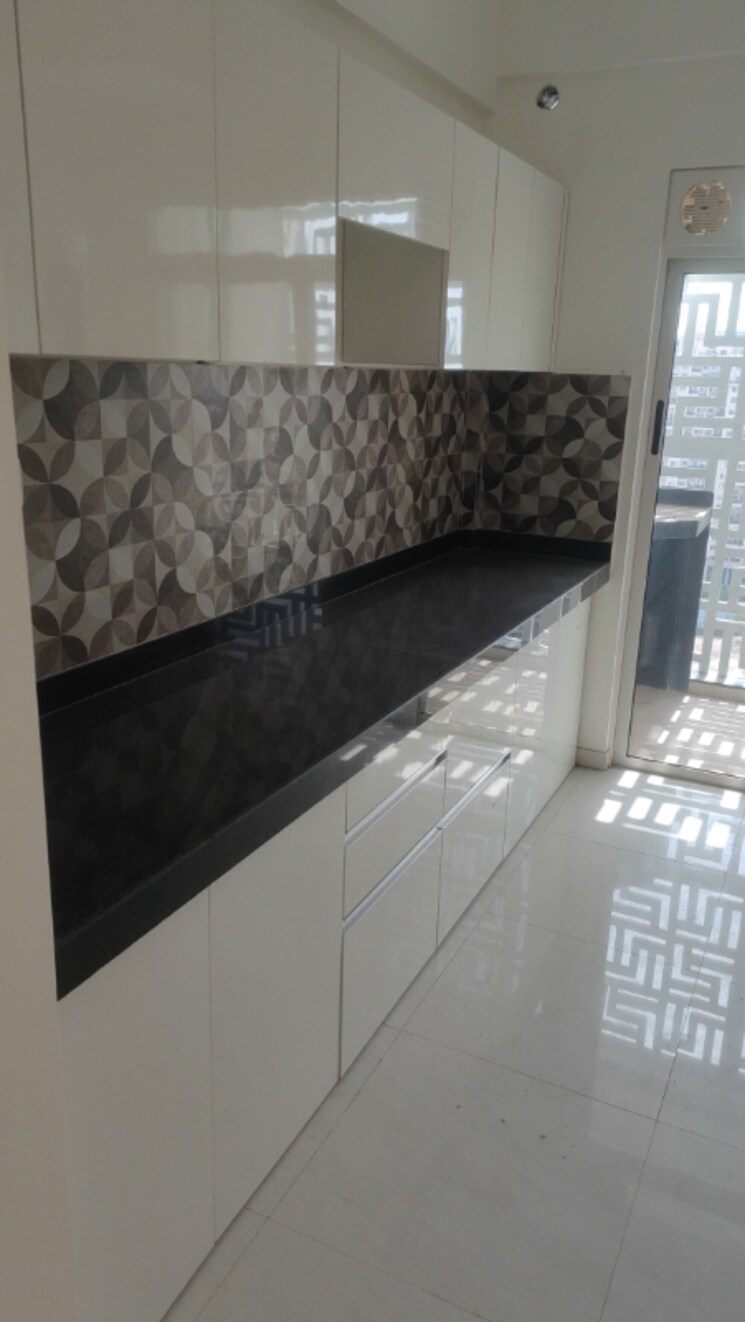 Kitchen, lodha-bella-vita 3 Bedroom 1005 Sq.Ft. Apartment In Nibm Road Pune 8755730