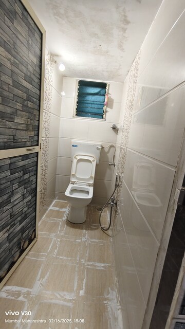 Bathroom in 1 BHK Apartment at Silver Bells CHS, Dahisar West – for Sale