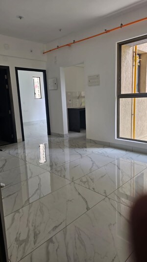 Bathroom in 1 BHK Apartment at Raymond Realty Phase II, Pokhran Road No Two – for Sale