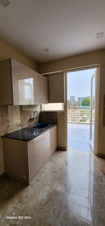 Kitchen in 4 BHK Apartment at Adore Legend, Sector 84 – for Sale