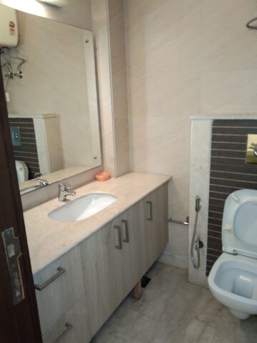 Bathroom in 3 BHK Builder Floor at Jor Bagh – for Rent
