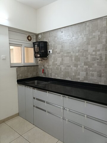 Kitchen in 2 BHK Apartment at Anand Eastwoods, Viman Nagar – for Rent