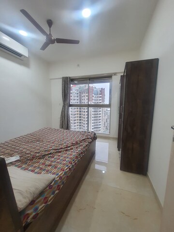 Bedroom in 2 BHK Apartment at Chandak Cornerstone, Worli – for Rent