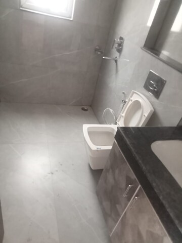 Bathroom in 3 BHK Apartment at Rishita Manhattan, Gomti Nagar – for Rent