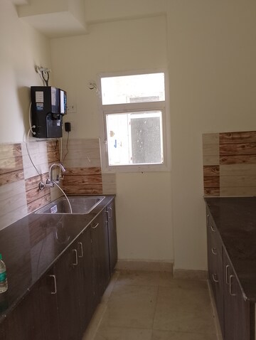 Kitchen in 2 BHK Apartment at Tech Zone 4 Greater Noida – for Rent