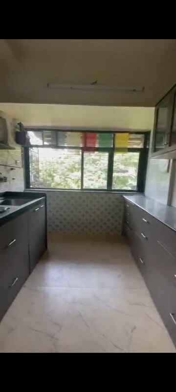 Kitchen in 3 BHK Apartment at Troika Apartment, Andheri West – for Rent