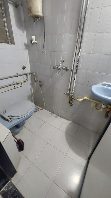 Bathroom in 2 BHK Apartment at Gaurav Villa, Kandivali West – for Sale