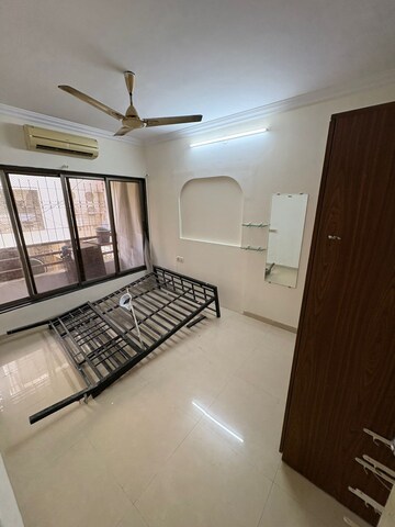 Living Room in 2.5 BHK Apartment at Pratik Apartments Andheri, Andheri West – for Rent
