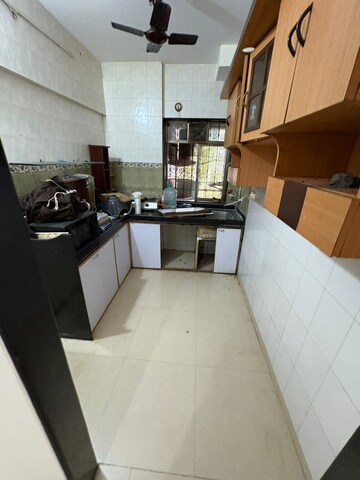 Kitchen in 2.5 BHK Apartment at Pratik Apartments Andheri, Andheri West – for Rent