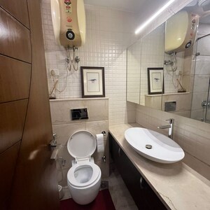 Bathroom in 3 BHK Builder Floor at Uday Park – for Sale