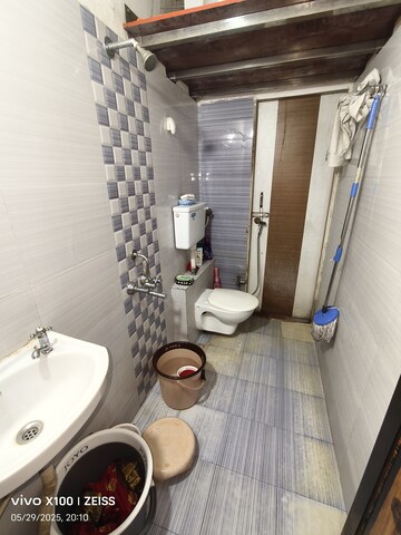 Bathroom in 1 BHK Apartment at Kharigaon – for Rent