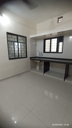 Kitchen in 2 BHK Apartment at Oxy Beaumonde, Viman Nagar – for Sale