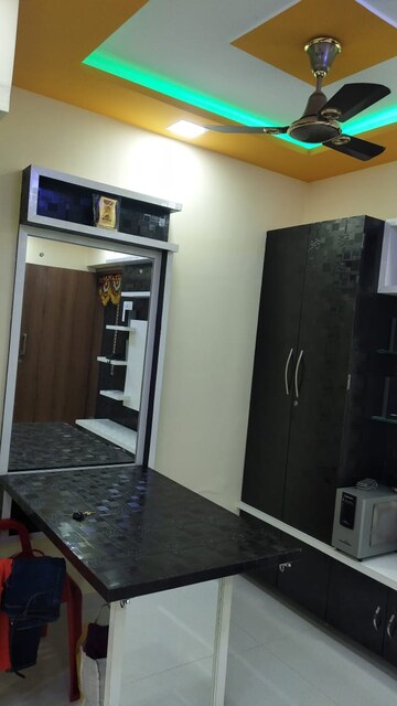 Kitchen in 1 BHK Apartment at Parsik Nagar – for Sale