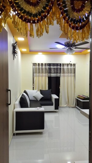 Living Room in 1 BHK Apartment at Parsik Nagar – for Sale