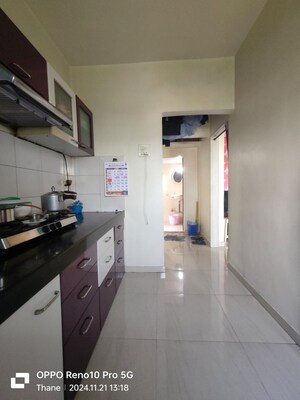 Kitchen in 1 BHK Apartment at Parsik Nagar – for Sale
