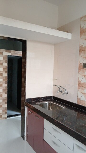 Kitchen in 3 BHK Apartment at Ajanta CHS Shivaji Nagar, Shivaji Nagar – for Sale