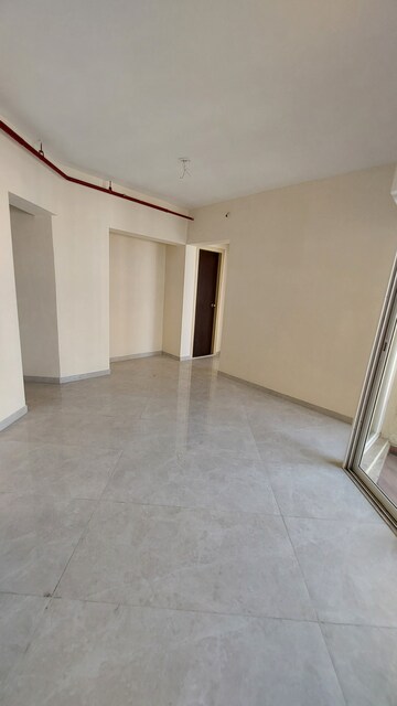 Living Room in 2 BHK Apartment at Bharat Ecovistas, Shilphata – for Sale