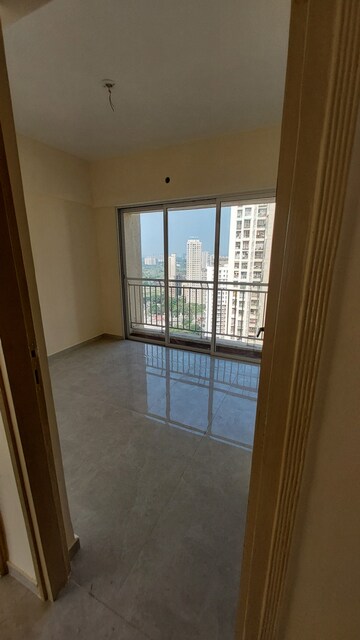 Bedroom in 2 BHK Apartment at Bharat Ecovistas, Shilphata – for Sale