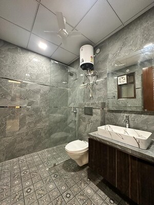 Bathroom in 4 BHK Builder Floor at Niti Khand I – for Sale