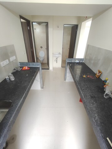 Kitchen in 2 BHK Apartment at Rustomjee Avenue L1, Virar West – for Rent