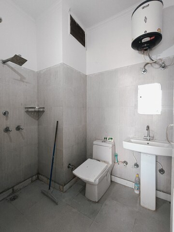 Bathroom in 2 BHK Apartment at Sunny Enclave – for Rent