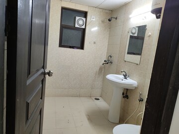 Bathroom in 2 BHK Apartment at Logix Blossom County, Sector 137 – for Rent