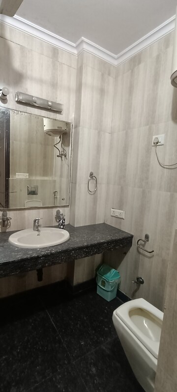 Bathroom in 3.5 BHK Builder Floor at Kalkaji – for Rent