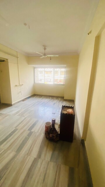 Living Room in 1 BHK Apartment at Kamala Vihar CHS, Kandivali West – for Rent