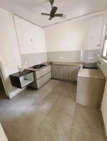 Kitchen in 3 BHK Apartment at Hiranandani Estate Rodas Enclave, Ghodbunder Road – for Rent