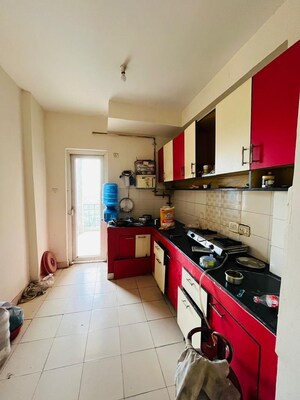 Kitchen in 2 BHK Apartment at Nimbus Express Park View, Chi V Greater Noida – for Sale