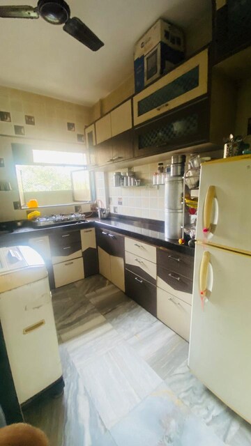 Kitchen in 1 BHK Apartment at Shubh Shanti Complex, Kandivali West – for Rent