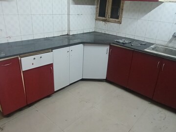 Kitchen in 2 BHK Apartment at Windsor and Nova Society, Ahinsa Khand 2 – for Sale
